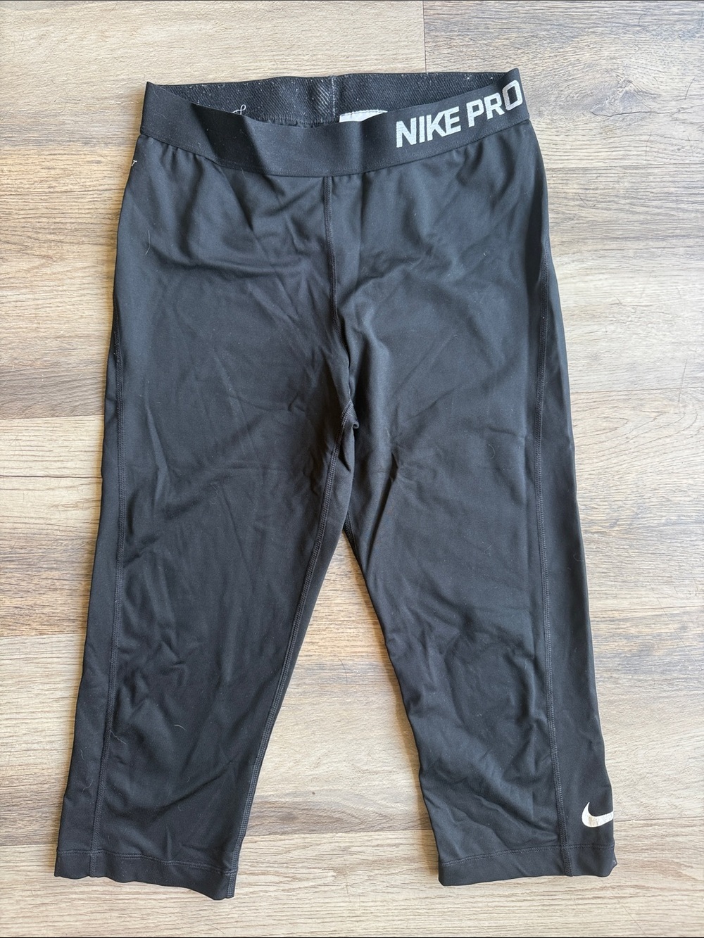 Nike Black Capri Leggings with White Swoosh